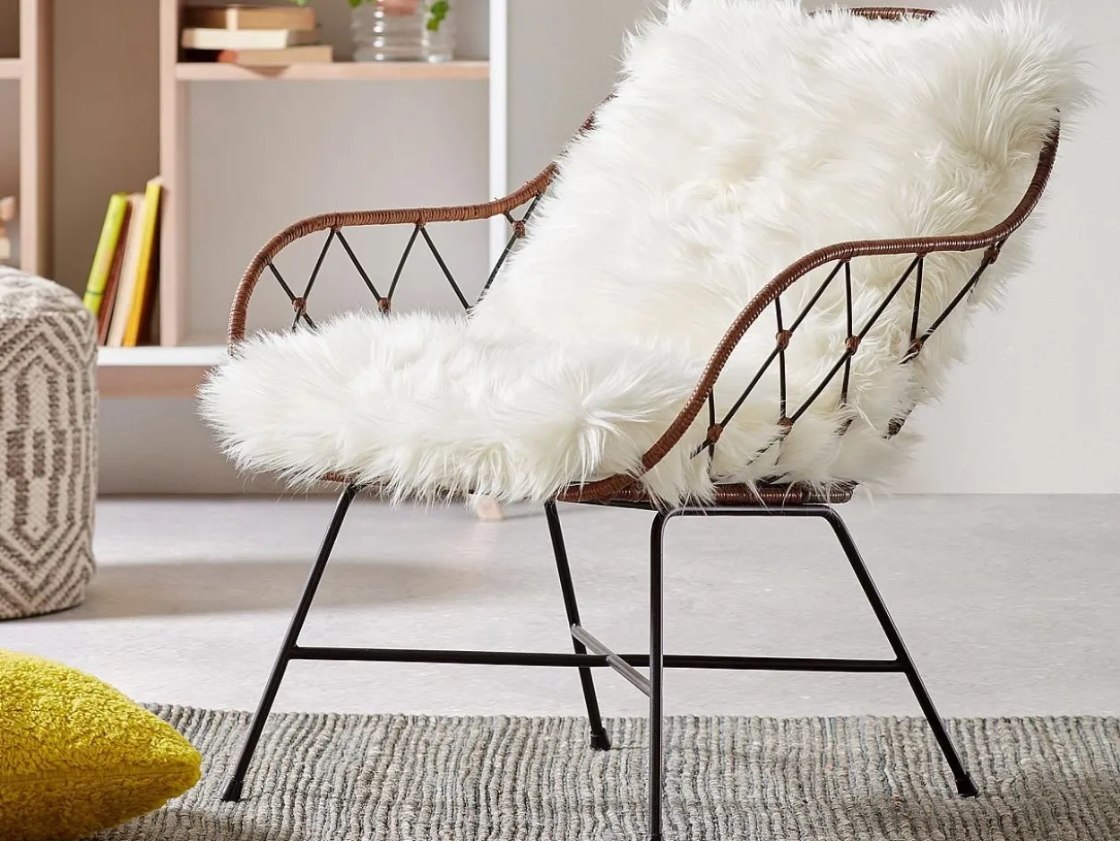 Poltrona Clara metallo nero e rattan